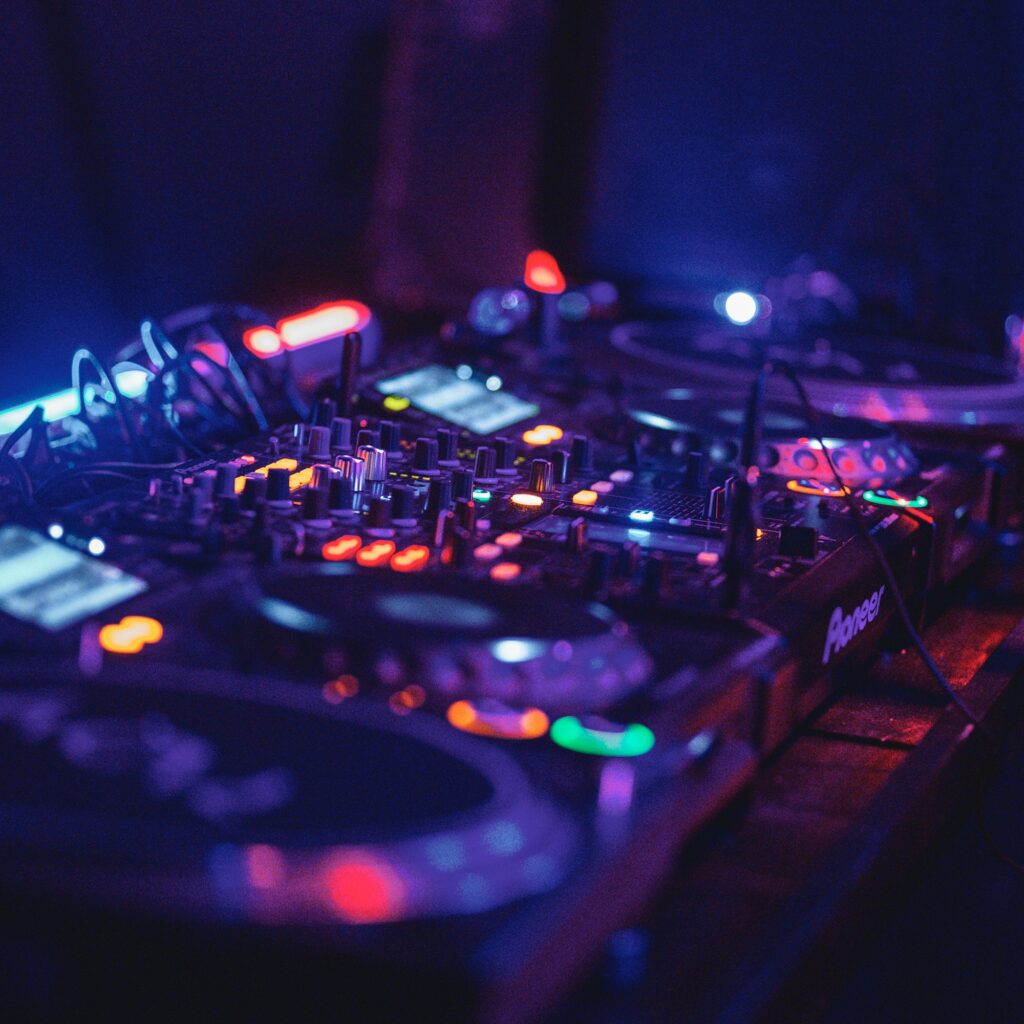 A lit up dj console