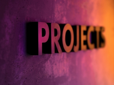 The word Project under purple and orange light