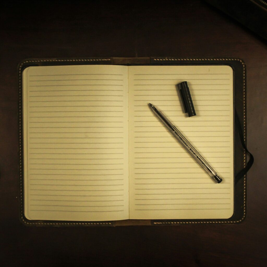 My Blog image of An open personal diary with two pages left to write on and a capless pen resting on top of it.